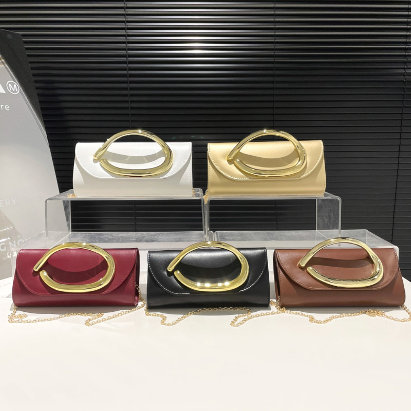 Ladies Gold handles clutch Bag